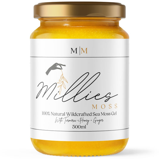 A jar of sea moss gel infused with turmeric, manuka honey, and ginger, labeled 'Millie's Moss'. Front view of a 500ml jar a nutrient-rich natural supplement for immunity and skin health