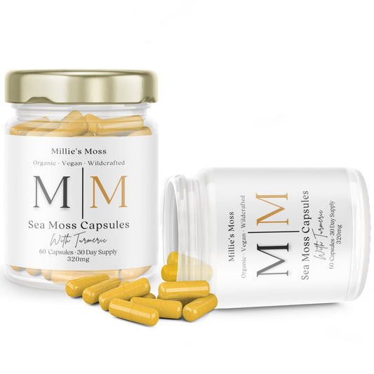 Glass jars of Sea Moss Capsules with turmeric and capsules spilling out