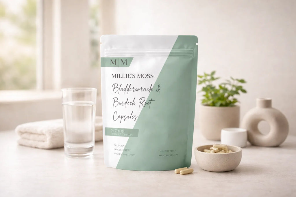 Millie’s Moss bladderwrack and burdock root capsules displayed with natural herbal ingredients.