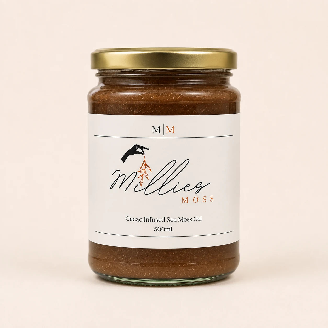 Millie’s Moss Cacao Infused Sea Moss Gel 500ml jar on a warm off-white background.