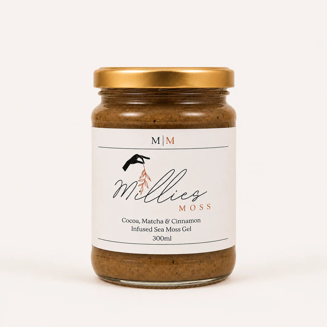 Millie’s Moss Cocoa, Matcha & Cinnamon Infused Sea Moss Gel 300ml jar on a warm off-white background.