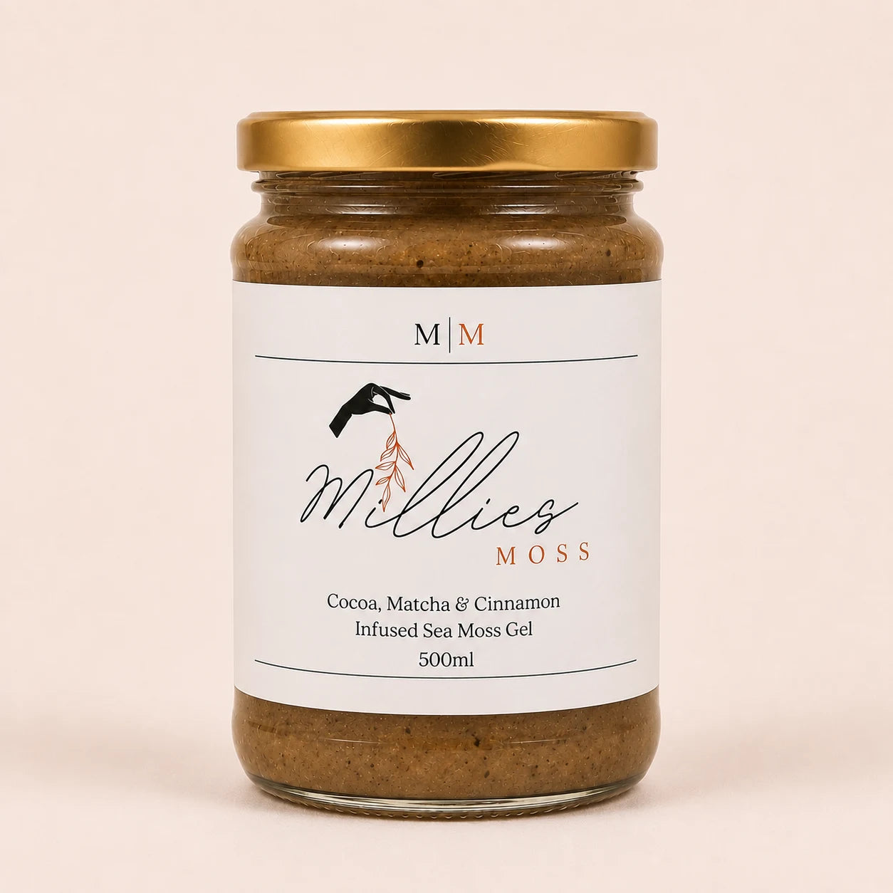 Millie’s Moss Cocoa, Matcha & Cinnamon Infused Sea Moss Gel 500ml jar on a warm off-white background.