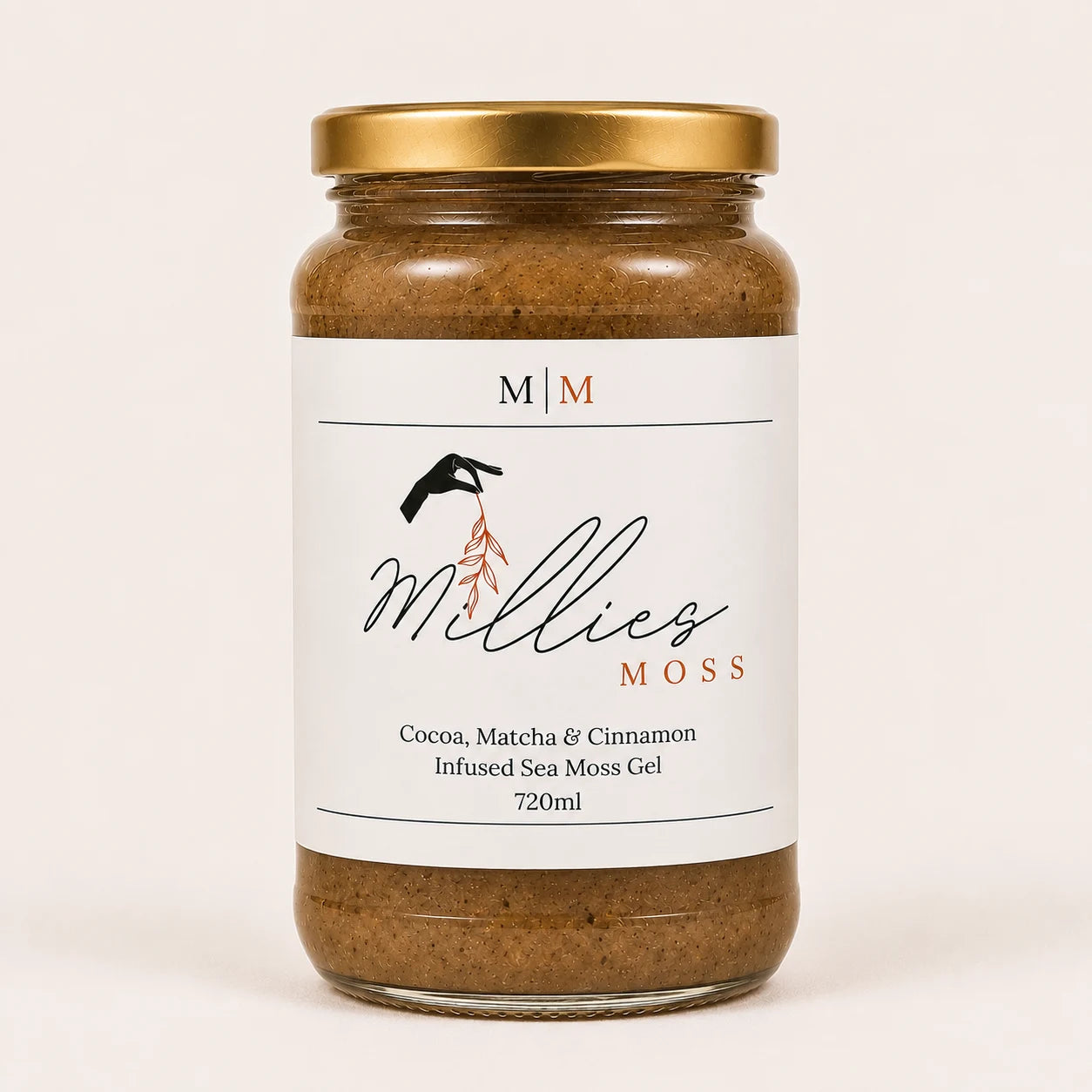 Millie’s Moss Cocoa, Matcha & Cinnamon Infused Sea Moss Gel 720ml jar on a warm off-white background.
