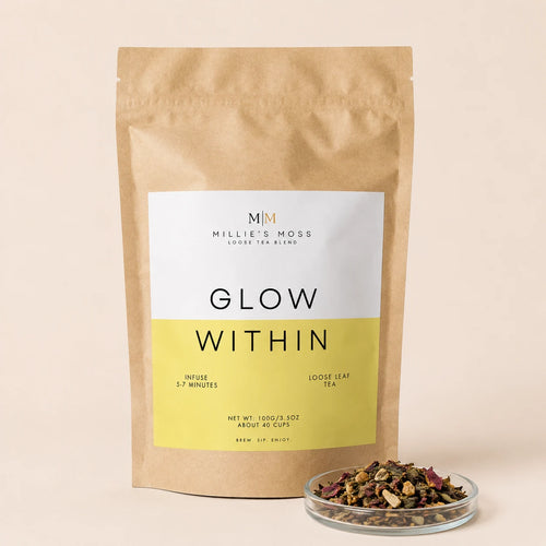 Millie’s Moss Glow Within Loose Leaf Tea Blend 100g with loose tea texture displayed in a small glass dish