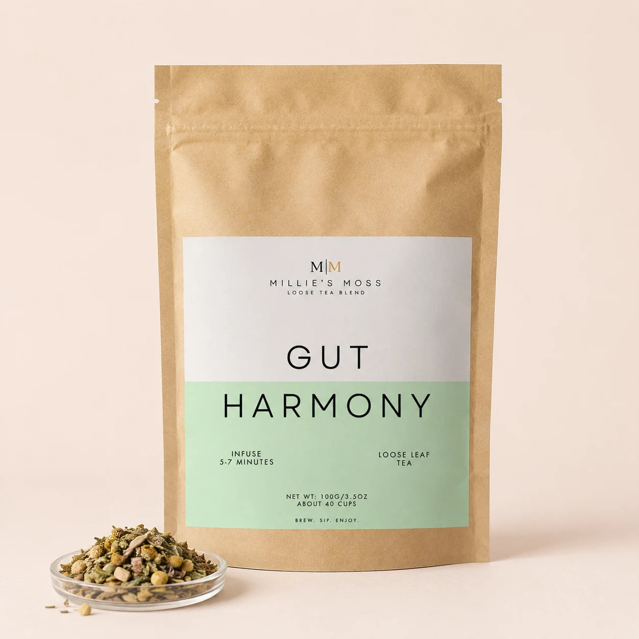 Millie’s Moss Gut Harmony Loose Leaf Tea Blend 100g with loose tea texture shown beside the pack