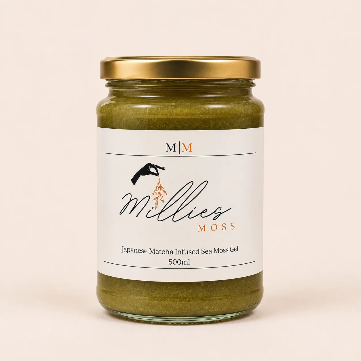 Millie’s Moss Japanese Matcha Infused Sea Moss Gel 500ml jar on a warm off-white background.