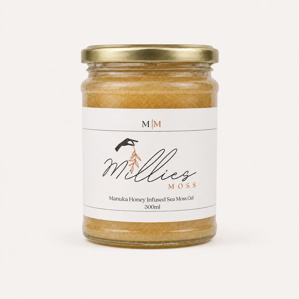 Millie’s Moss Manuka Honey Infused Sea Moss Gel 300ml jar on a warm off-white background. Temporary reference image for this flavour.
