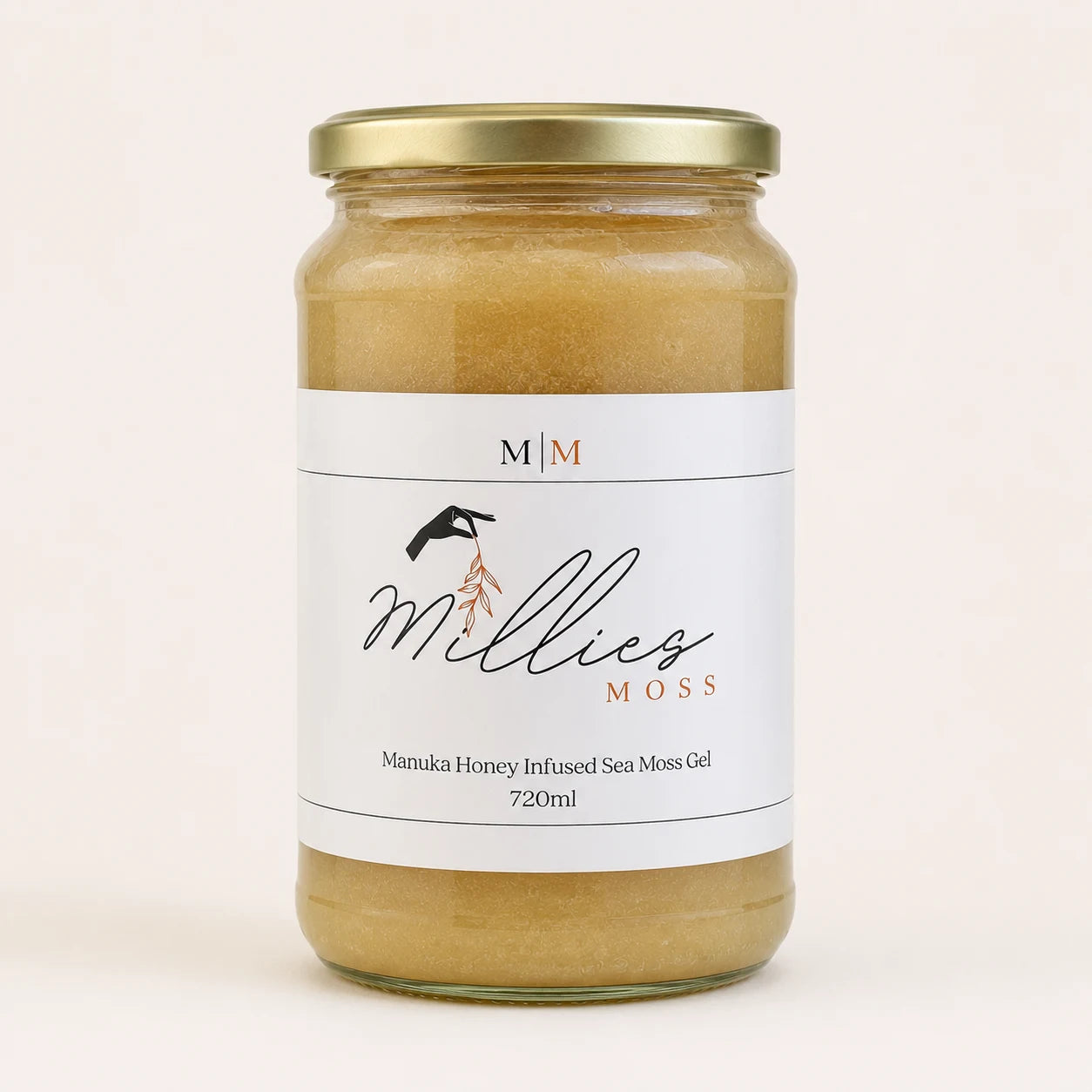 Millie’s Moss Manuka Honey Infused Sea Moss Gel 720ml jar on a warm off-white background.