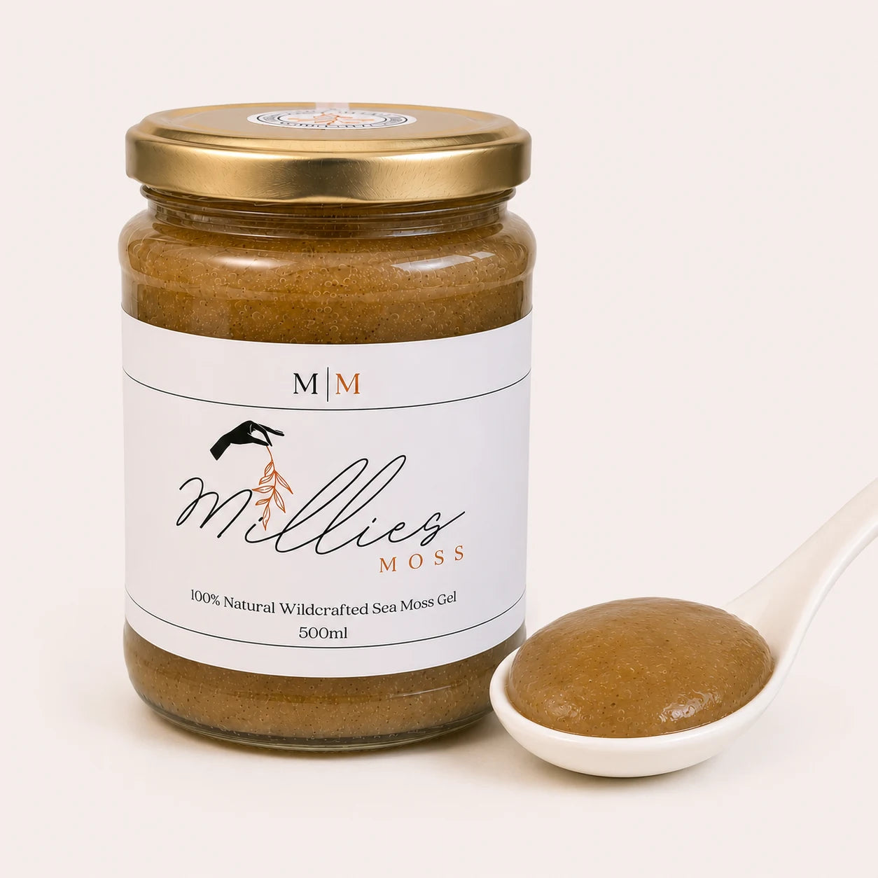 Close-up of Millie's Moss Bladderwrack Infused Sea Moss Gel showing its naturally blended texture beside the jar