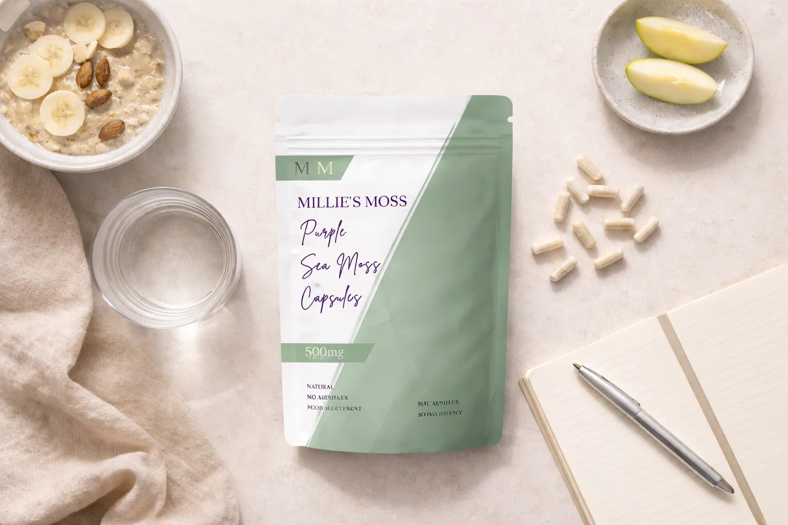 Flat lay of purple sea moss capsules with breakfast bowl, apple slices, and notebook for a daily wellness routine.