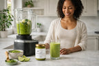 Millie’s Moss matcha sea moss gel beside a green smoothie and blender on a bright kitchen counter.